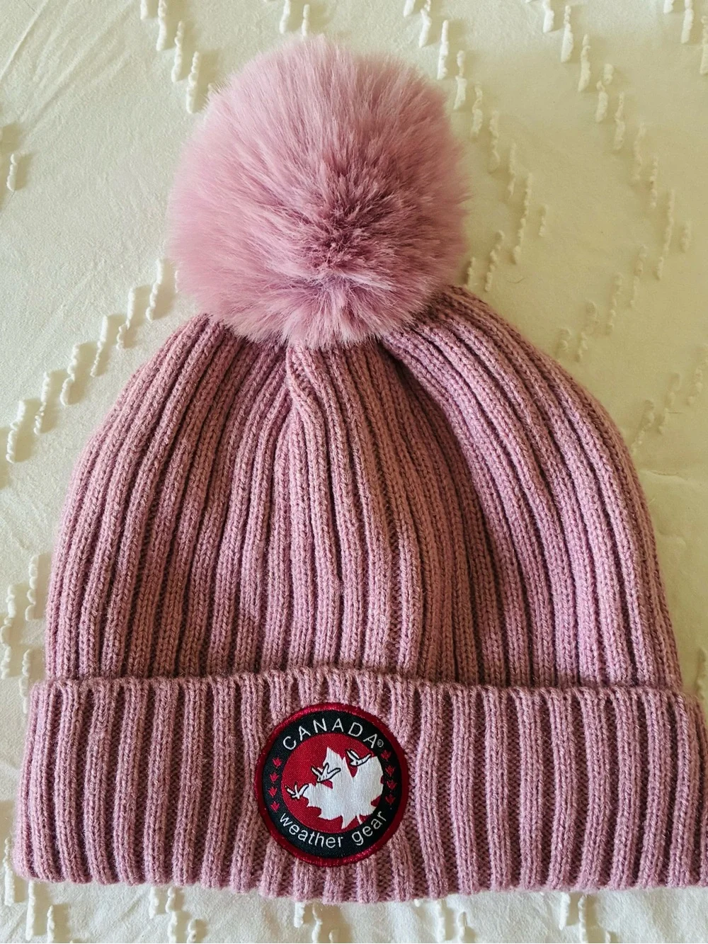 Canada weather gear pink beanie. Women winter hat gorpcore